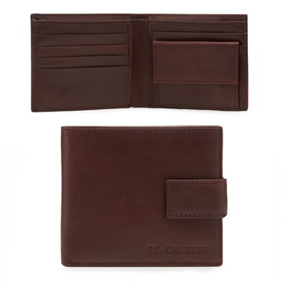 Brown leather wallet in a tin